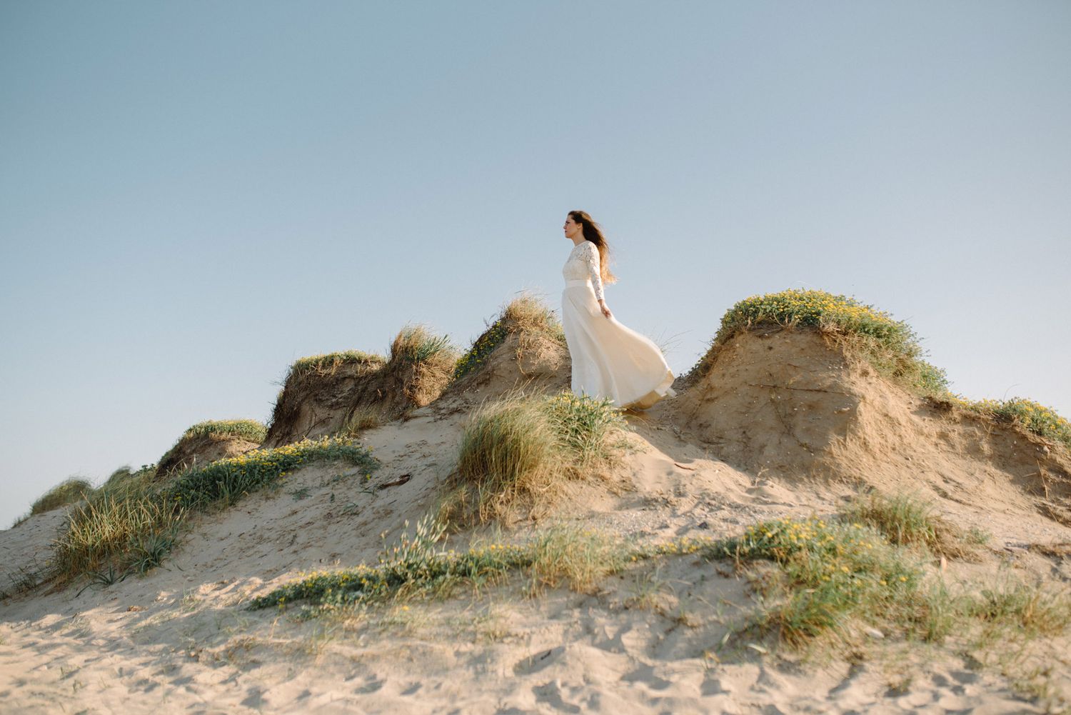 A bride on top of a dune in Valencia Spain