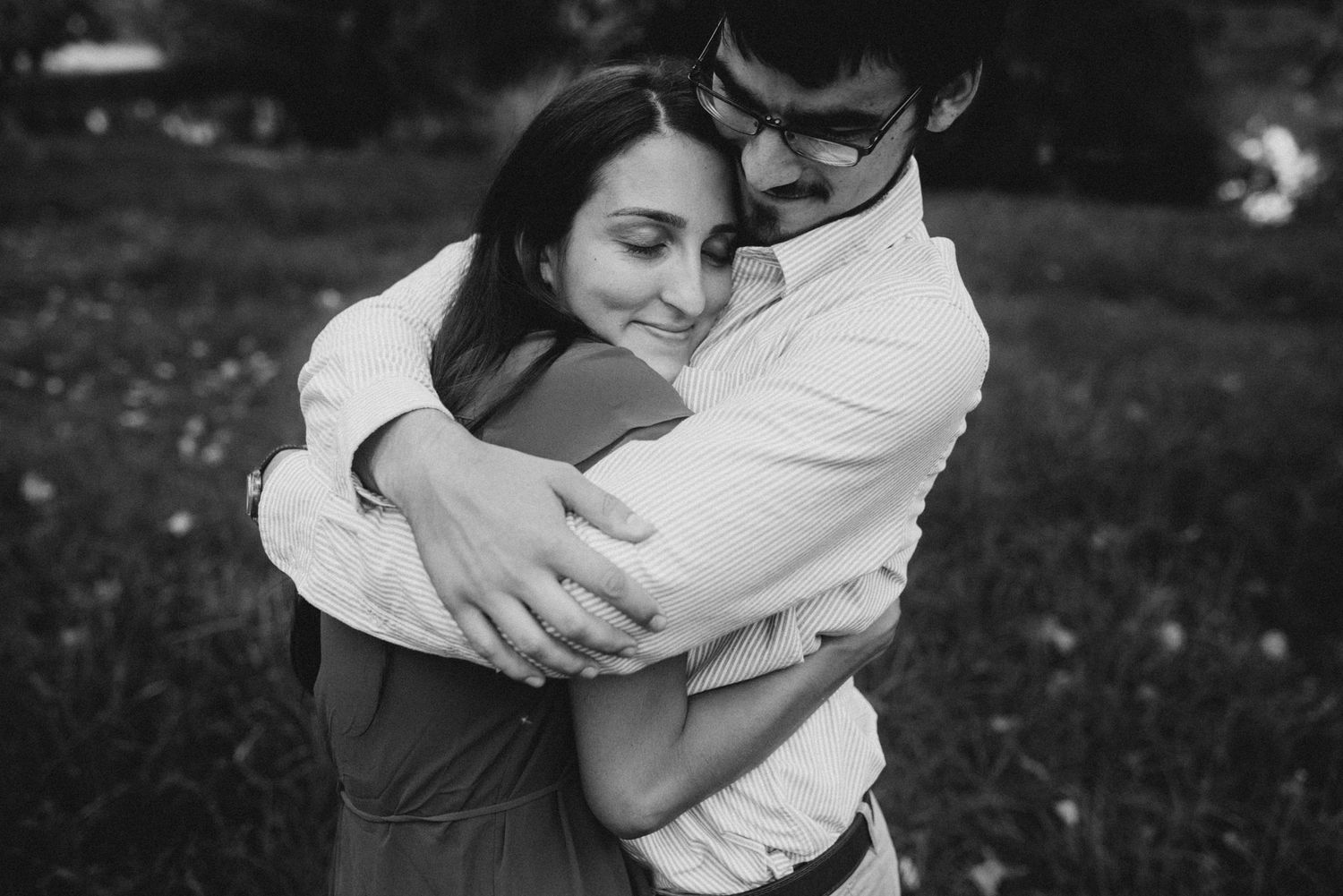 A couple hugging each other at Frederiksberg Have in Copenhagen