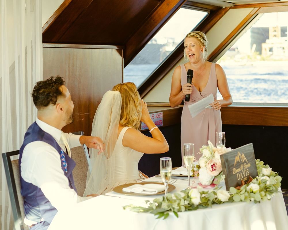 Authentic, genuine and candid photos of the speeches at the Starship of Tampa Bay Wedding in the summer time
