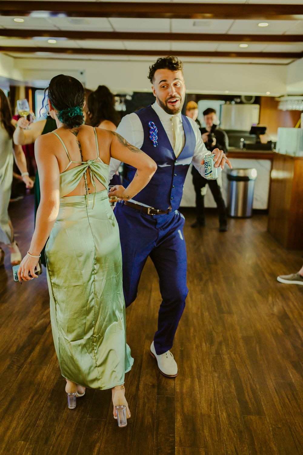 Candid-unposed, creative and fun dance floor photos of the guests on the day of the wedding at Yacht Starship,Florida.