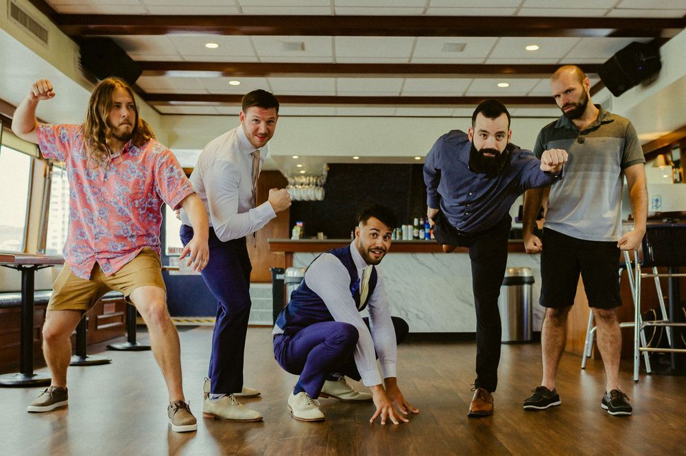 Groommen's Creative, fun and unique shots at the Yacht Starship in Tampa Florida in their summer florida wedding.