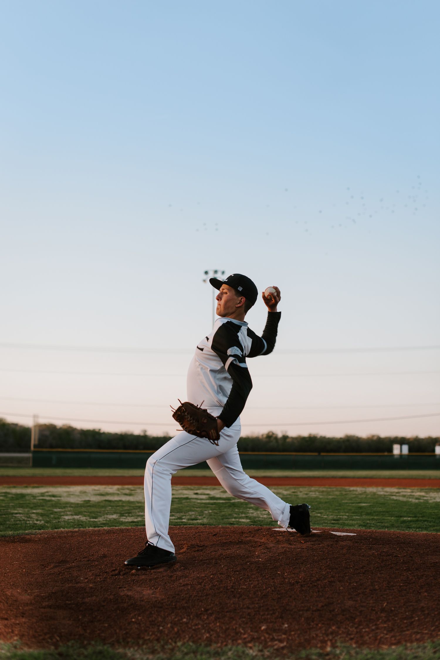 Campus Haysville high school senior pictures at baseball field - Derby, Wichita, KS photographer