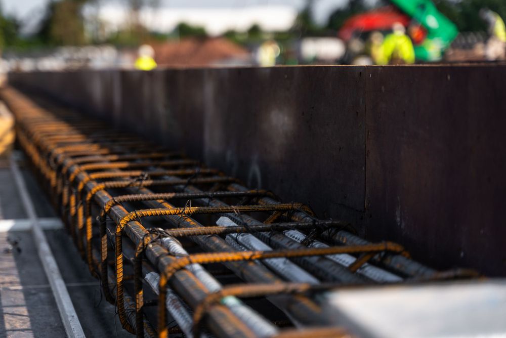 Close-up of construction rebar grid pattern with selective focus.