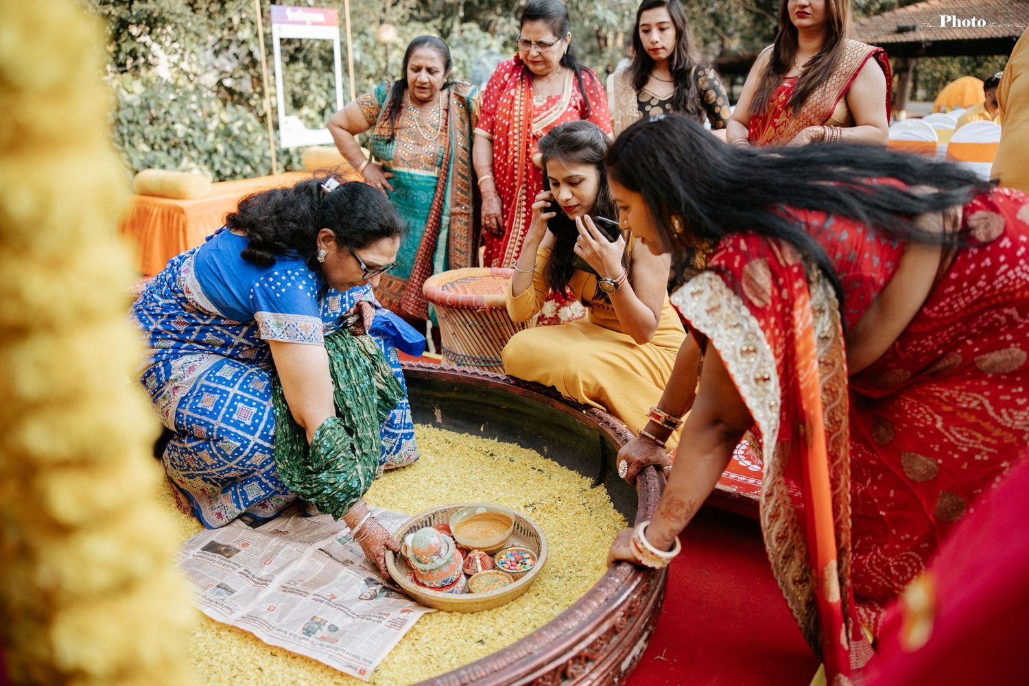 Traditional Indian wedding ceremony with guests participating in cultural rituals.