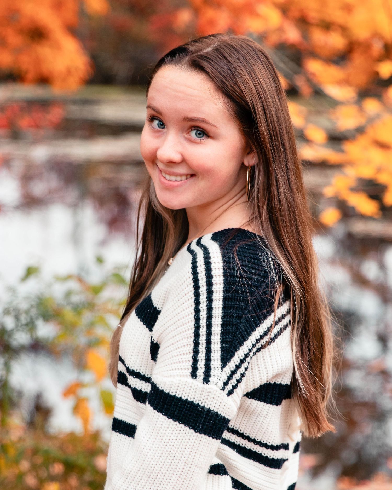 Senior Photos with Fall Foliage and Water