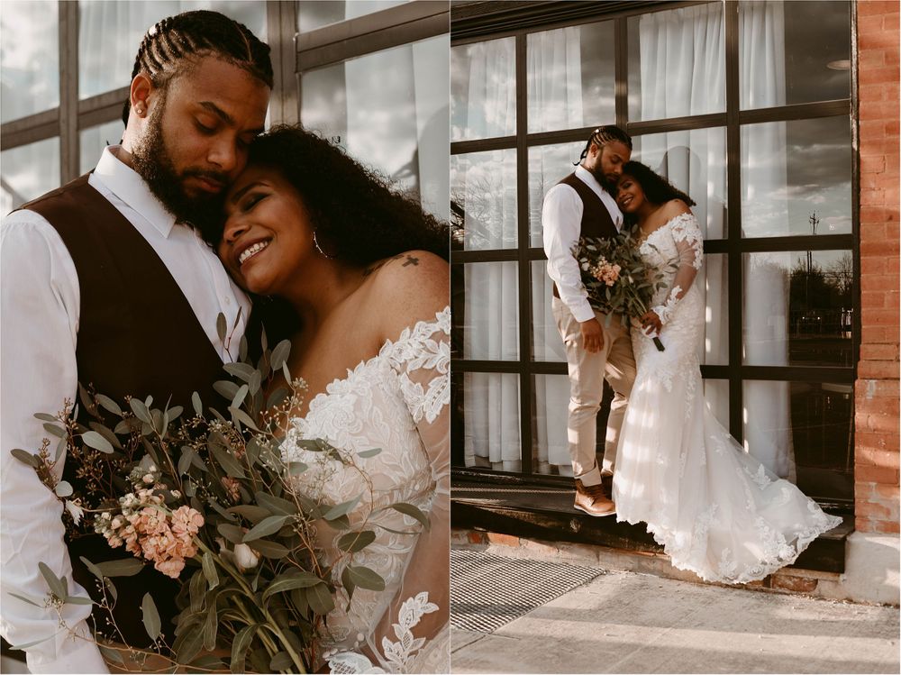 Wedding couple shares intimate moments in industrial-style venue with large windows.