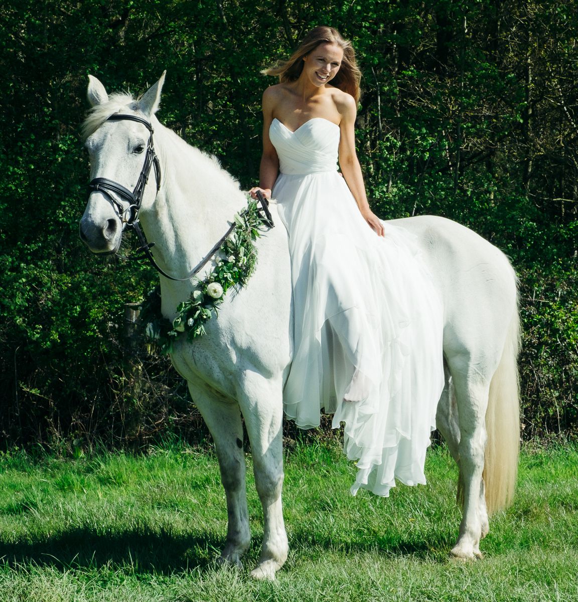 Wedding editorial portrait of bride on horse