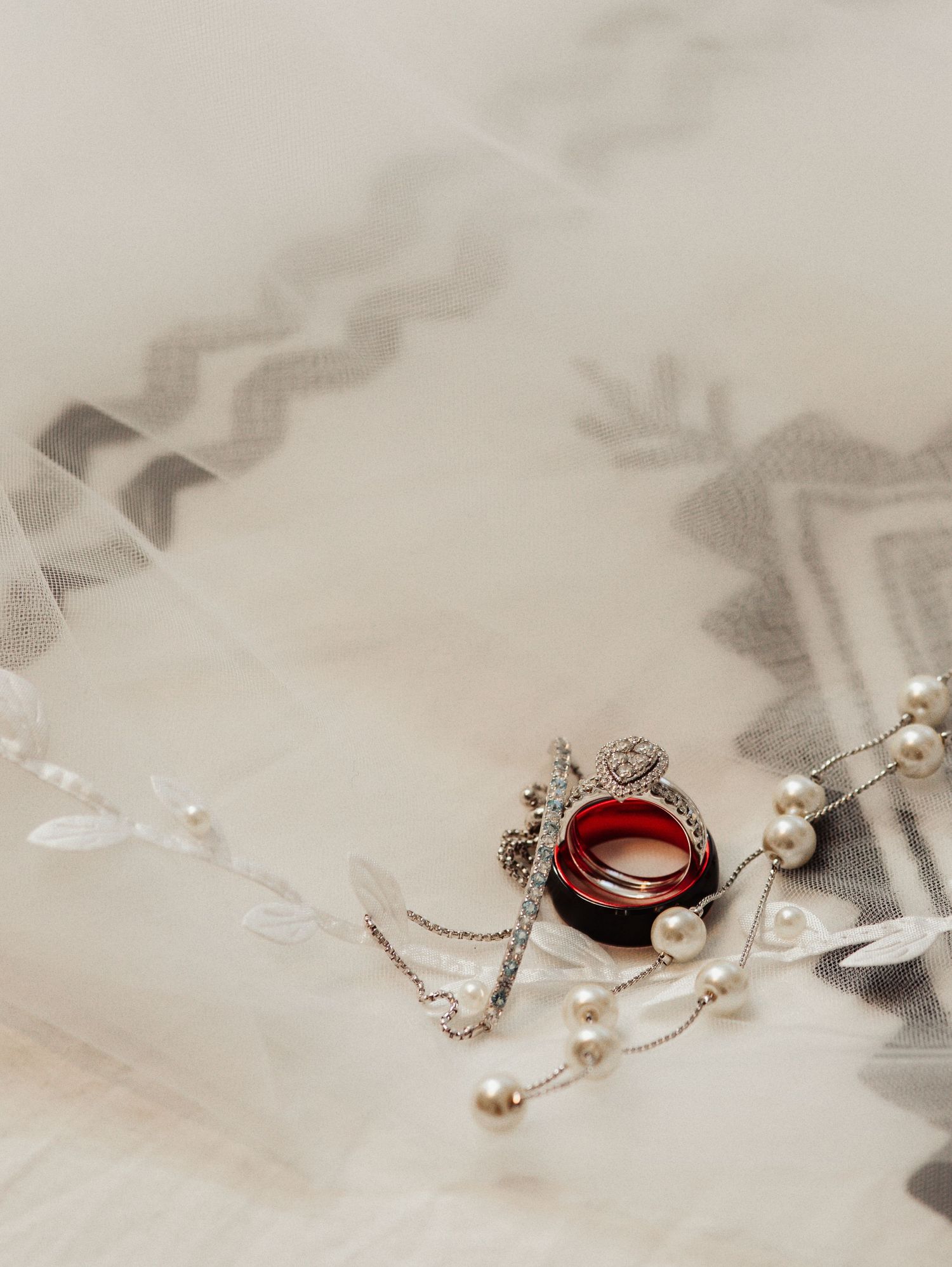Fort Worth Wedding at the Stock Yards with rose red colors and a white ivory dress heart diamond ring