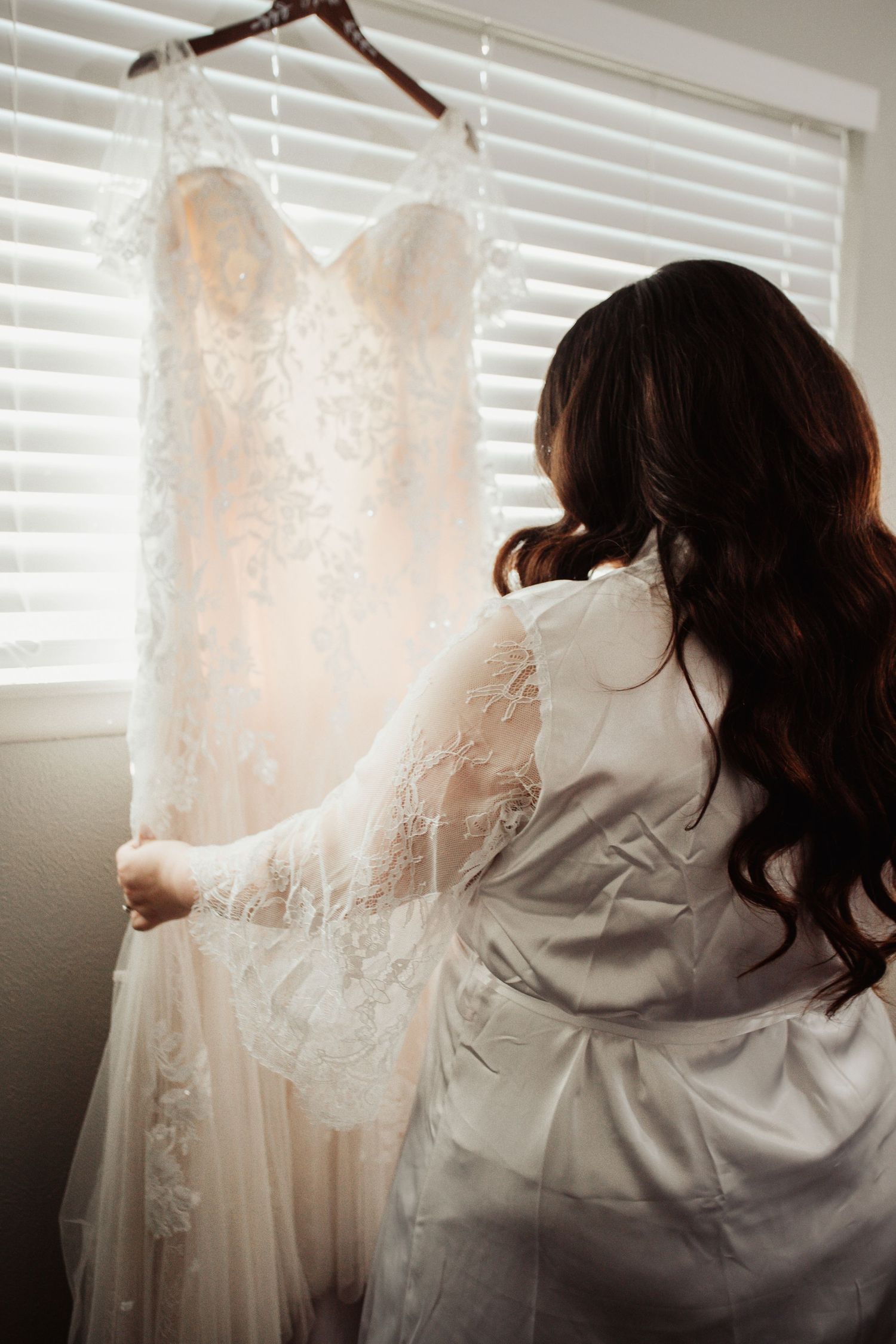 Fort Worth Wedding at the Stock Yards with golden lights and a white ivory dress and white tux