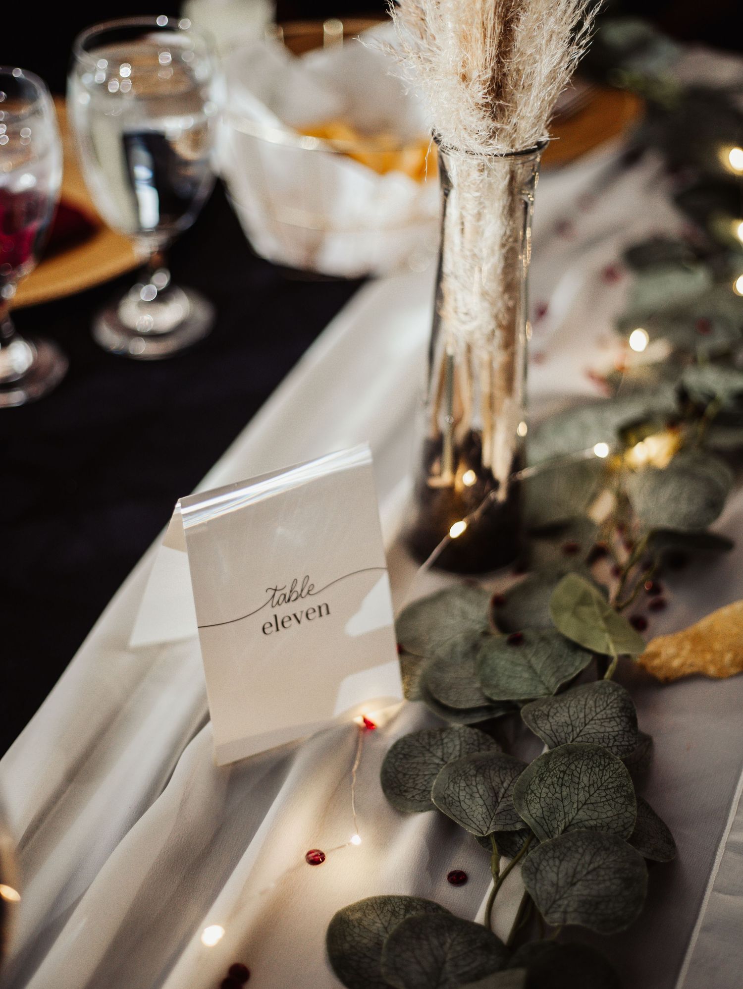Fort Worth Wedding at the Stock Yards with golden lights and a white ivory dress and white tux