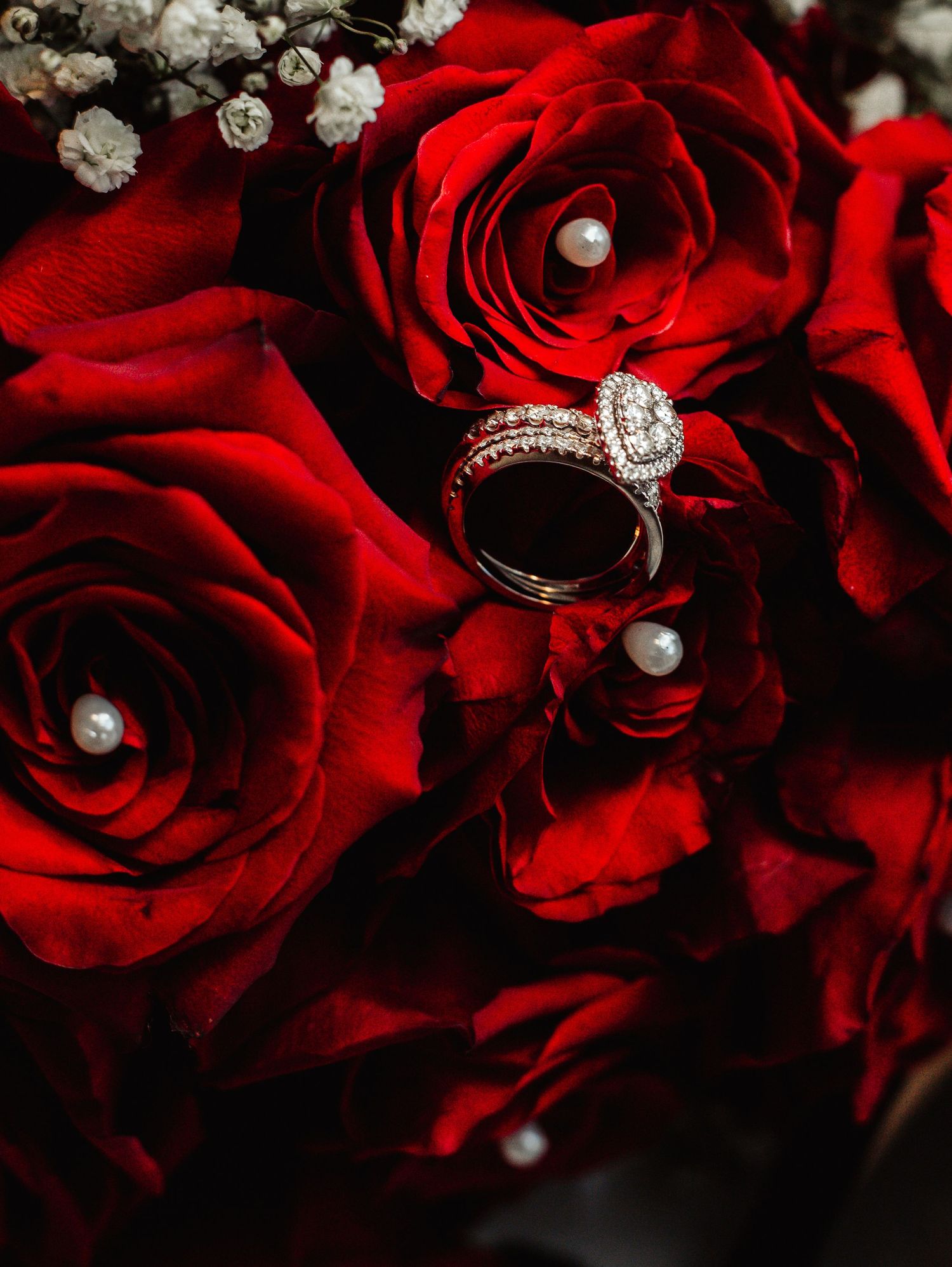 Fort Worth Wedding at the Stock Yards with rose red colors and a white ivory dress heart diamond ring