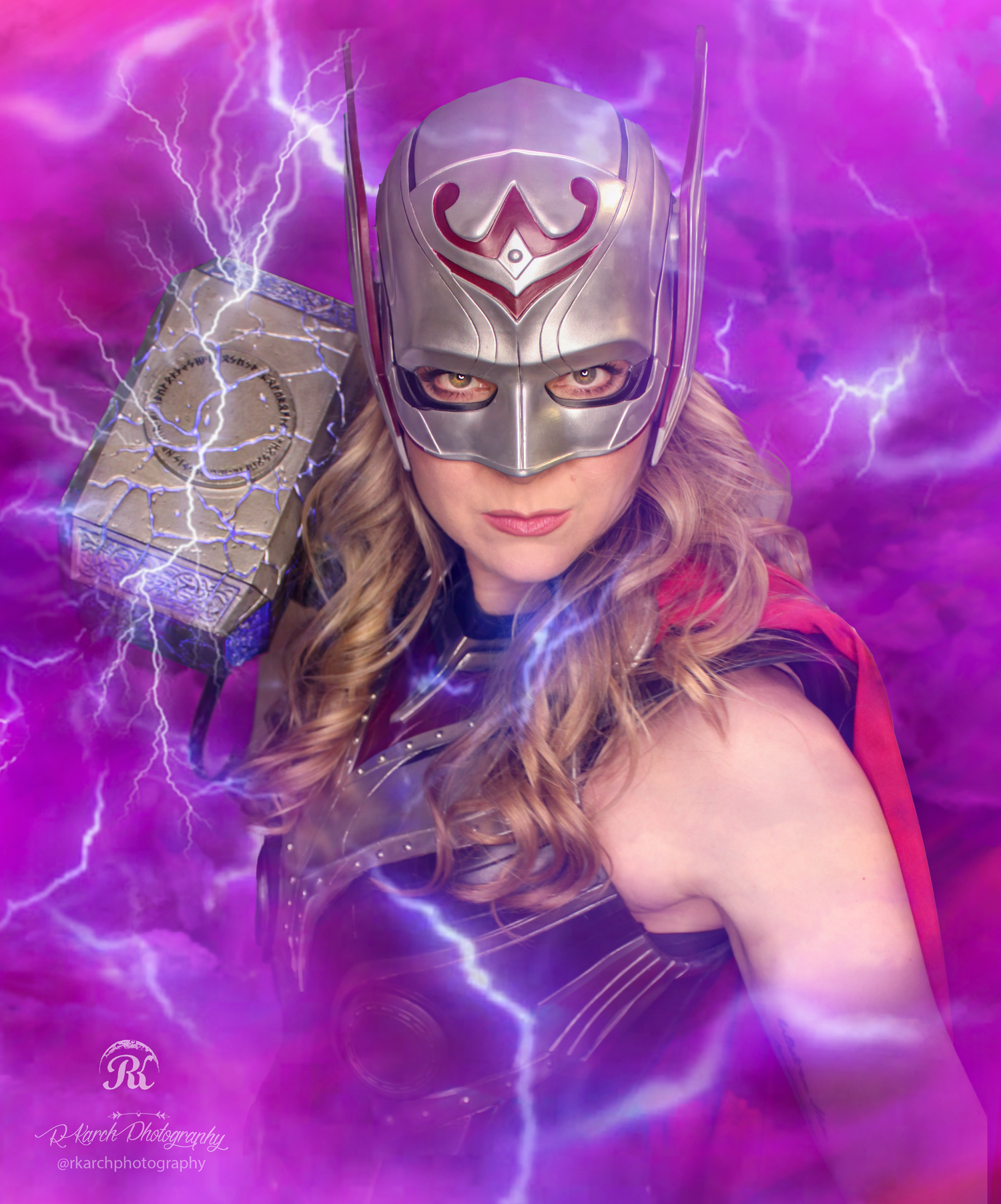Thor-inspired cosplay with purple lightning effects and mystical hammer.
