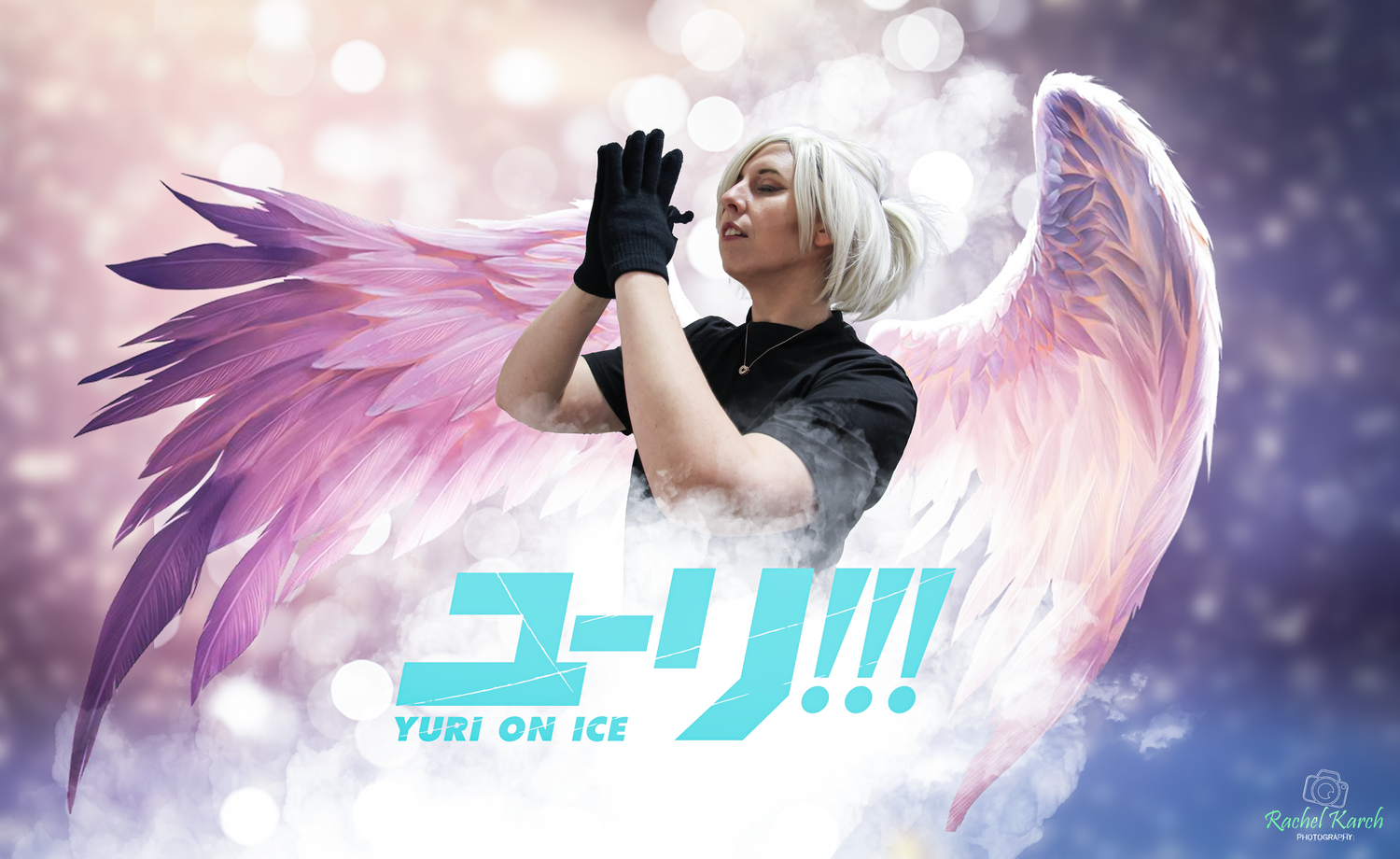 Cosplayer with white angel wings and black outfit inspired by Yuri on Ice anime.