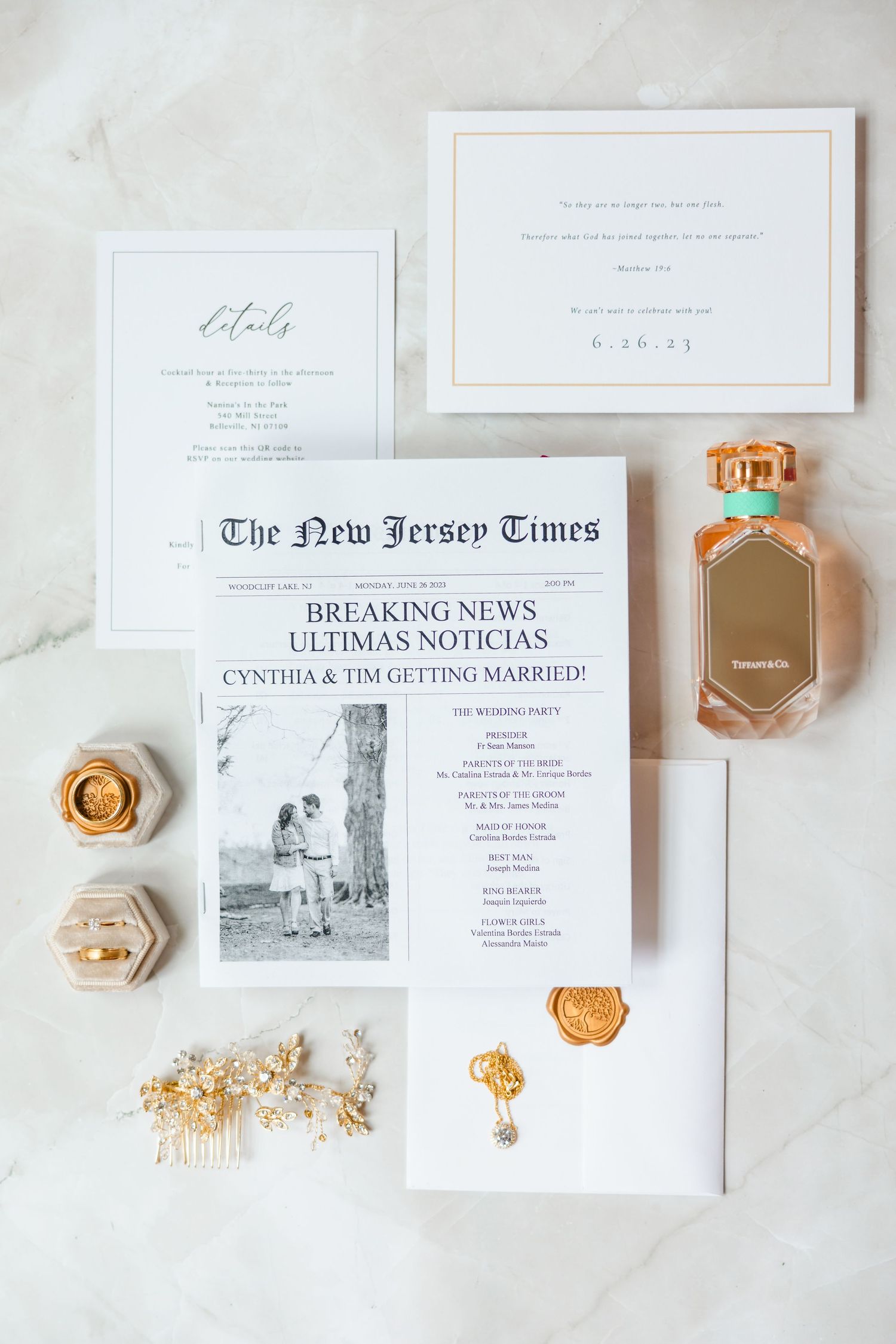 Elegant wedding stationery suite with newspaper-style program for Cynthia and Tim, perfume, and gold details.