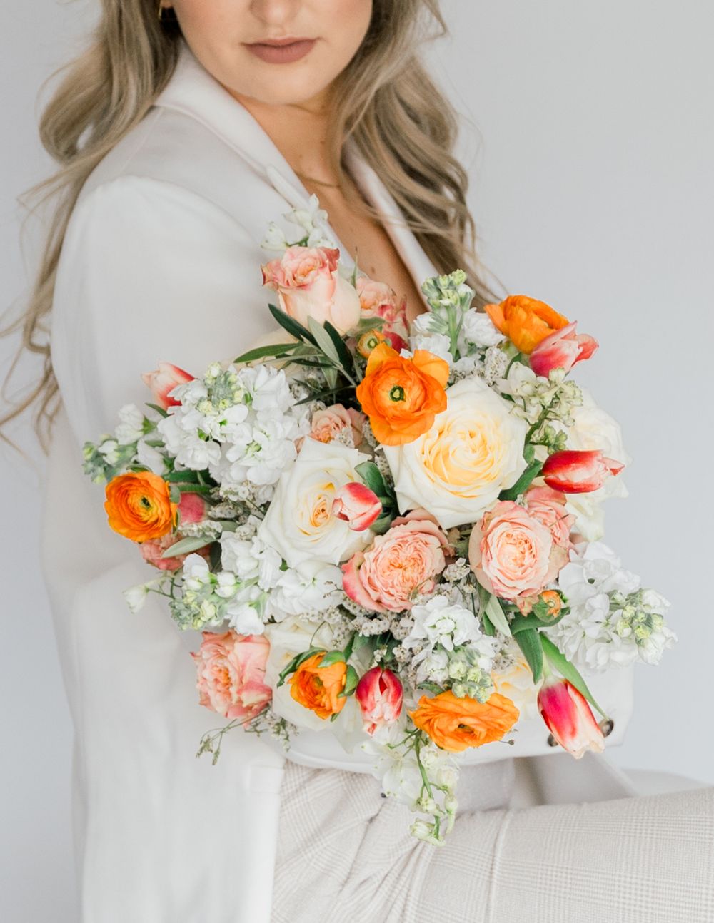 Leah Anne Kopp brand photo holding flowers