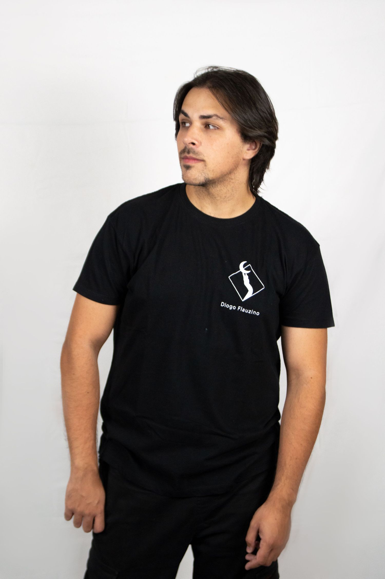 Man in black t-shirt with logo poses in multiple casual stances against white background.