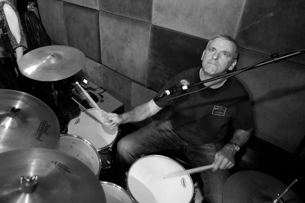 The drummer at the drums