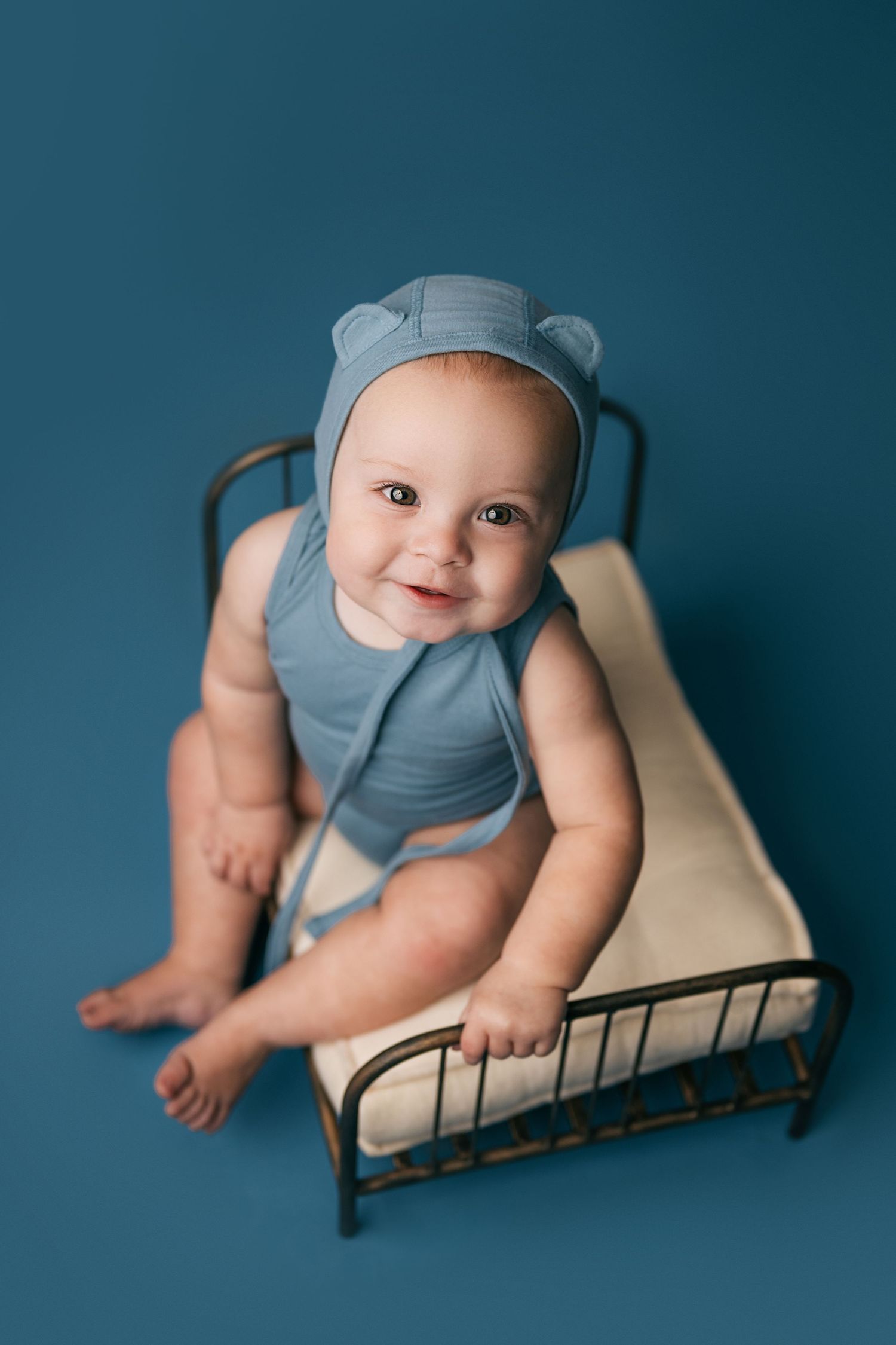 Infant boy on blue set Fort Wayne IN Huntington studio Hello Little Props