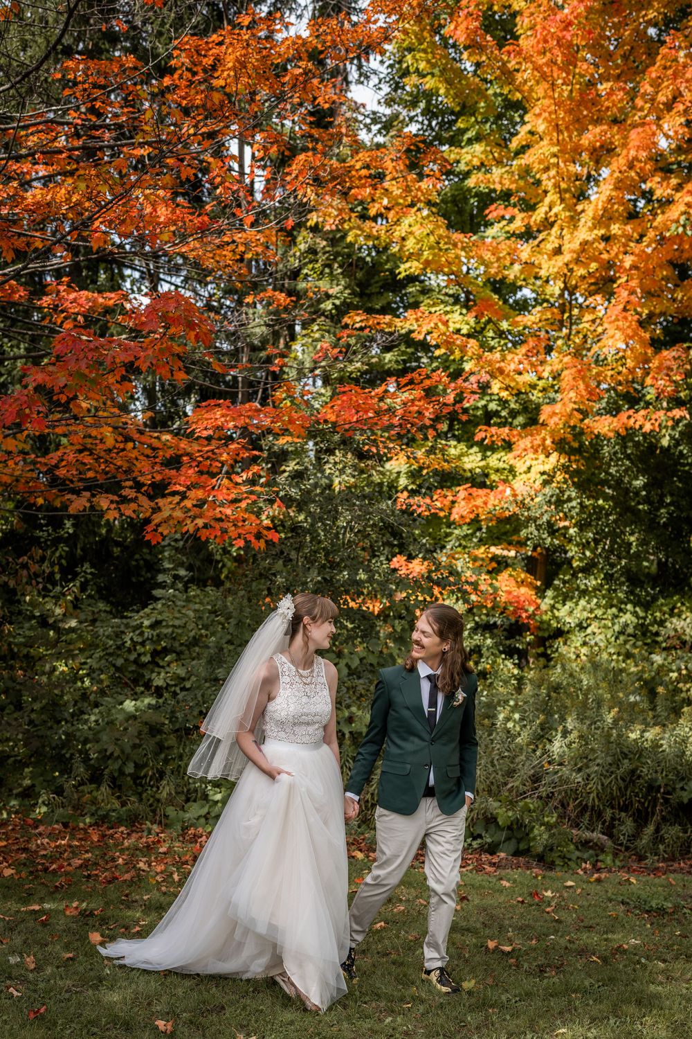 bride and groom walking outdoor fall autumn wedding photo in acton ontario