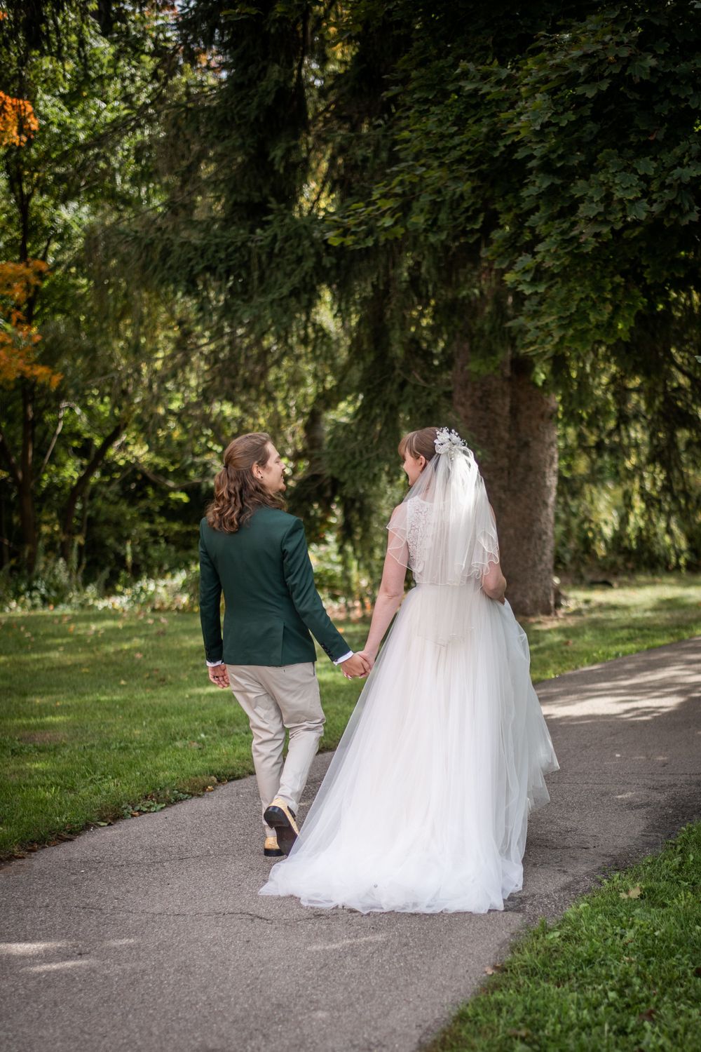 bride and groom walking outdoor fall autumn wedding photo in acton ontario