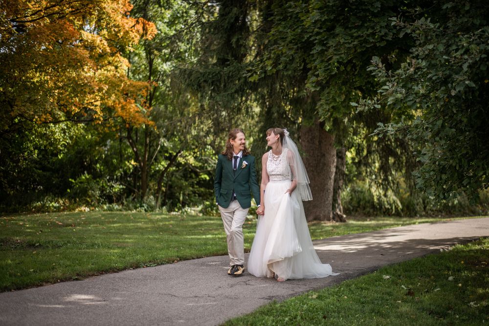 bride and groom walking outdoor fall autumn wedding photo in acton ontario