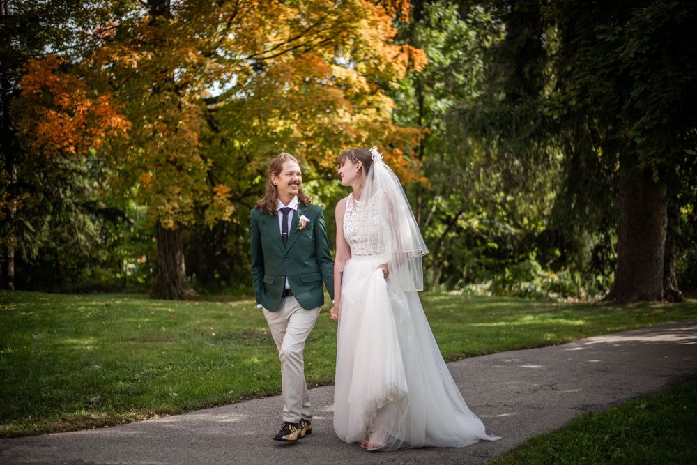 bride and groom walking outdoor fall autumn wedding photo in acton ontario