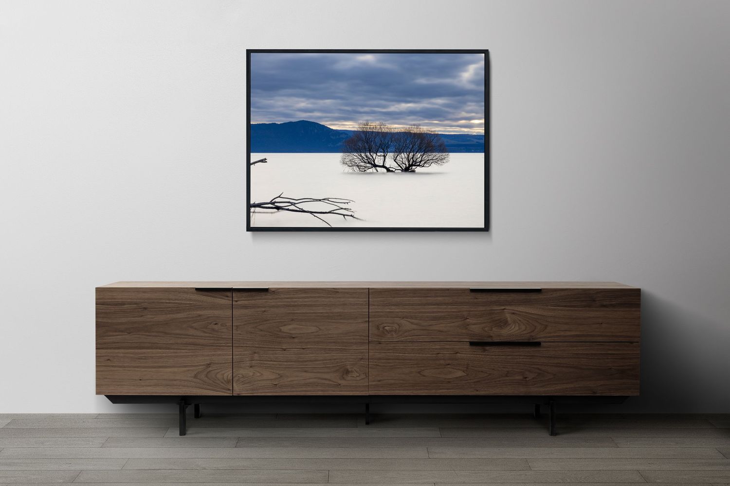 The stillness of Lake Taupo’s iconic tree, perfectly framed for modern living.