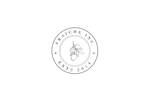 Circular vintage-style logo design with decorative elements and text in muted tones.