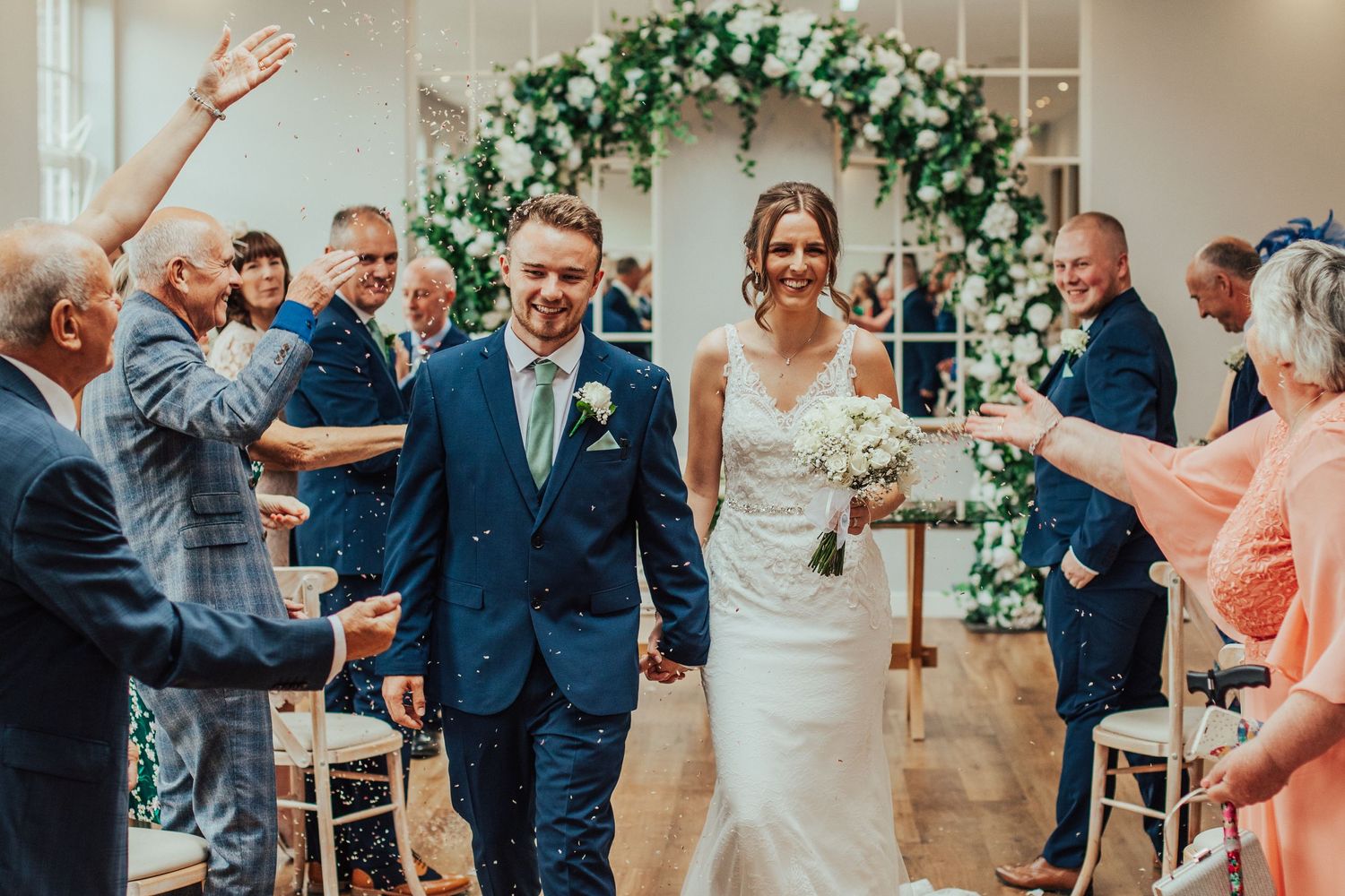 Confetti after the wedding ceremony at Bredenbury Court Barns. Herefordshire