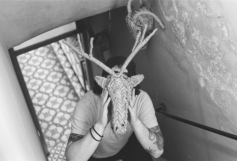 35mm film portrait black and white tattooed man in riad