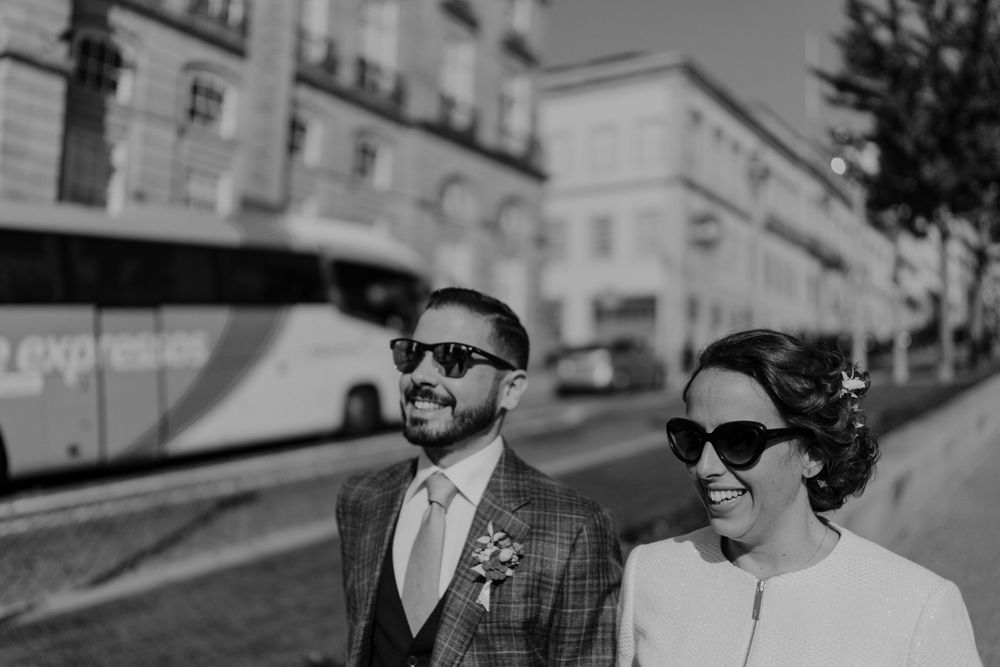 Bride and groom walking together in Porto after their wedding