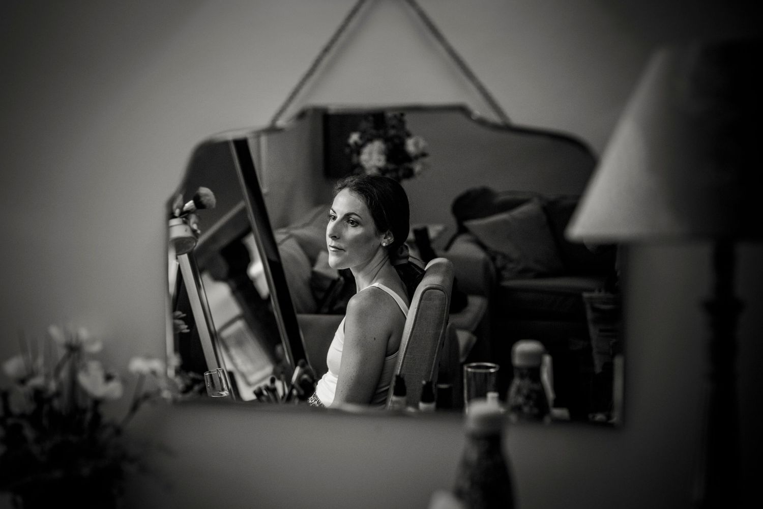 Black and white artistic shots of wedding day preparation details.