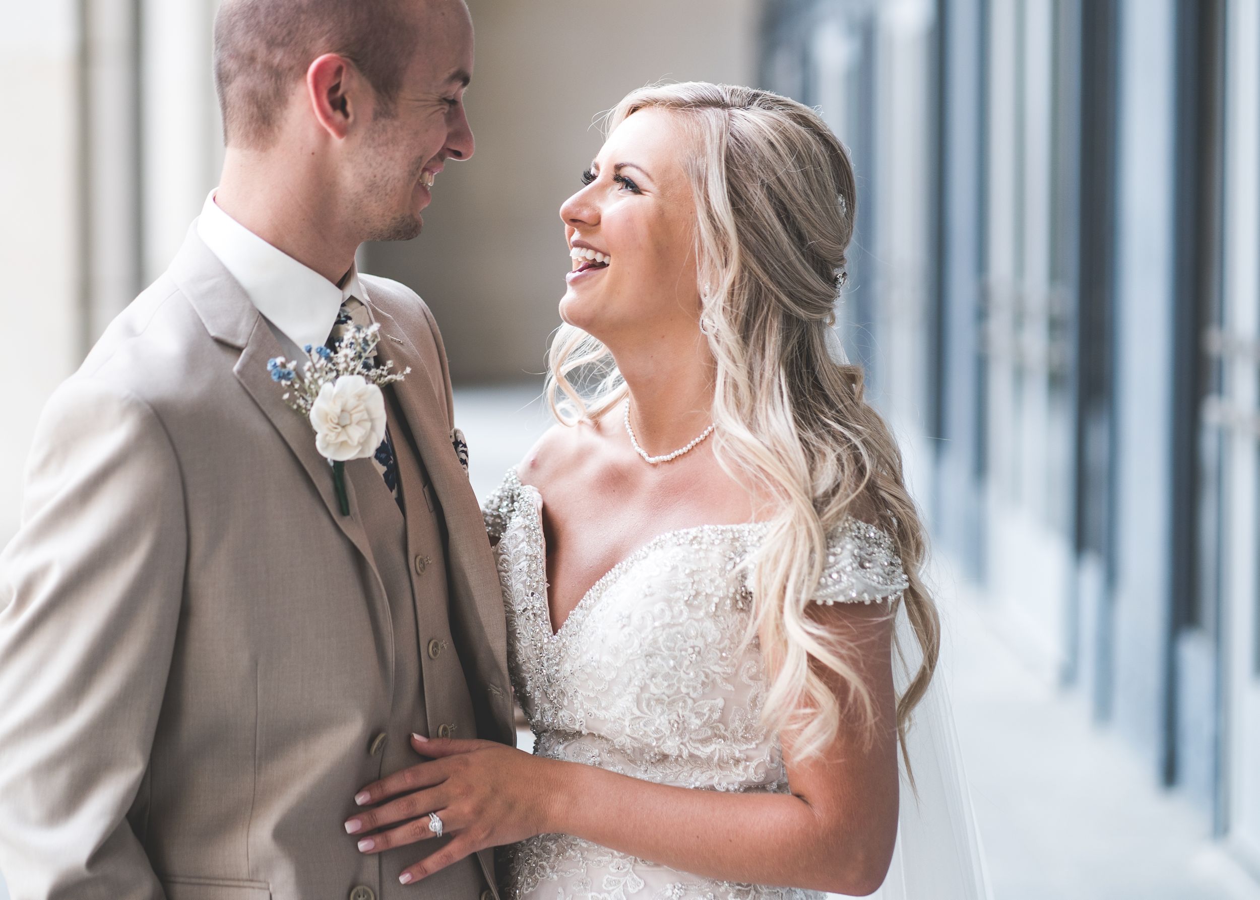 First Look Photos Bride and Groom. Downtown Grand Rapids Wedding Portraits. John Ball Zoo Weddings. Wedding Photography.