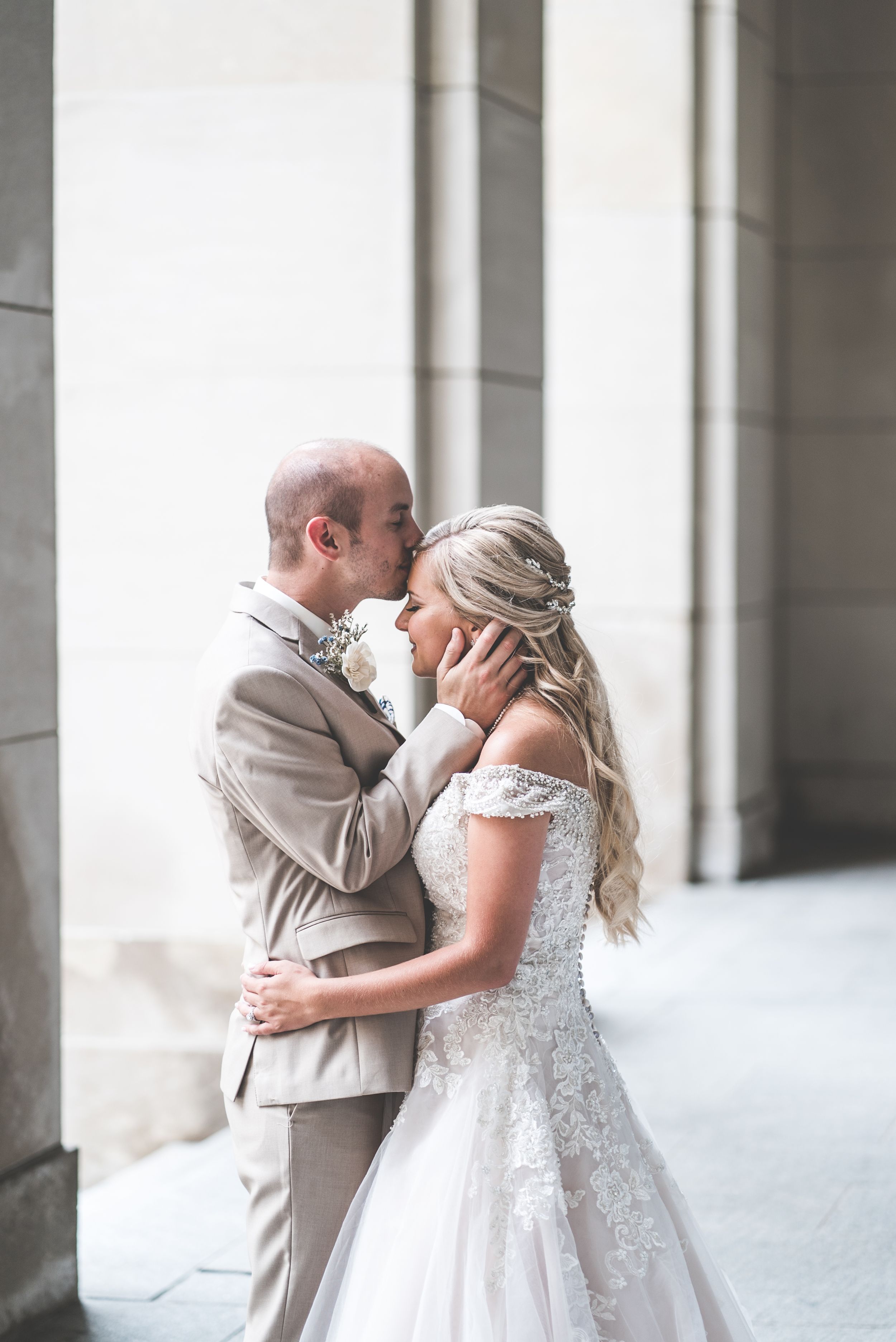 First Look Photos Bride and Groom. Downtown Grand Rapids Wedding Portraits. John Ball Zoo Weddings. Wedding Photography.