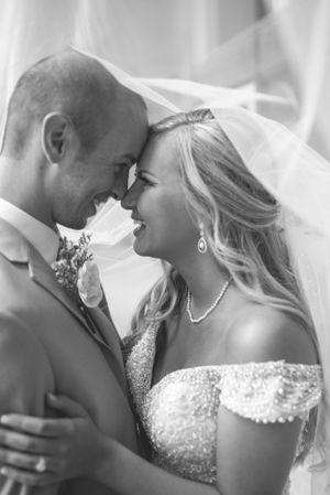 First Look Photos Bride and Groom. Downtown Grand Rapids Wedding Portraits. John Ball Zoo Weddings. Wedding Photography.