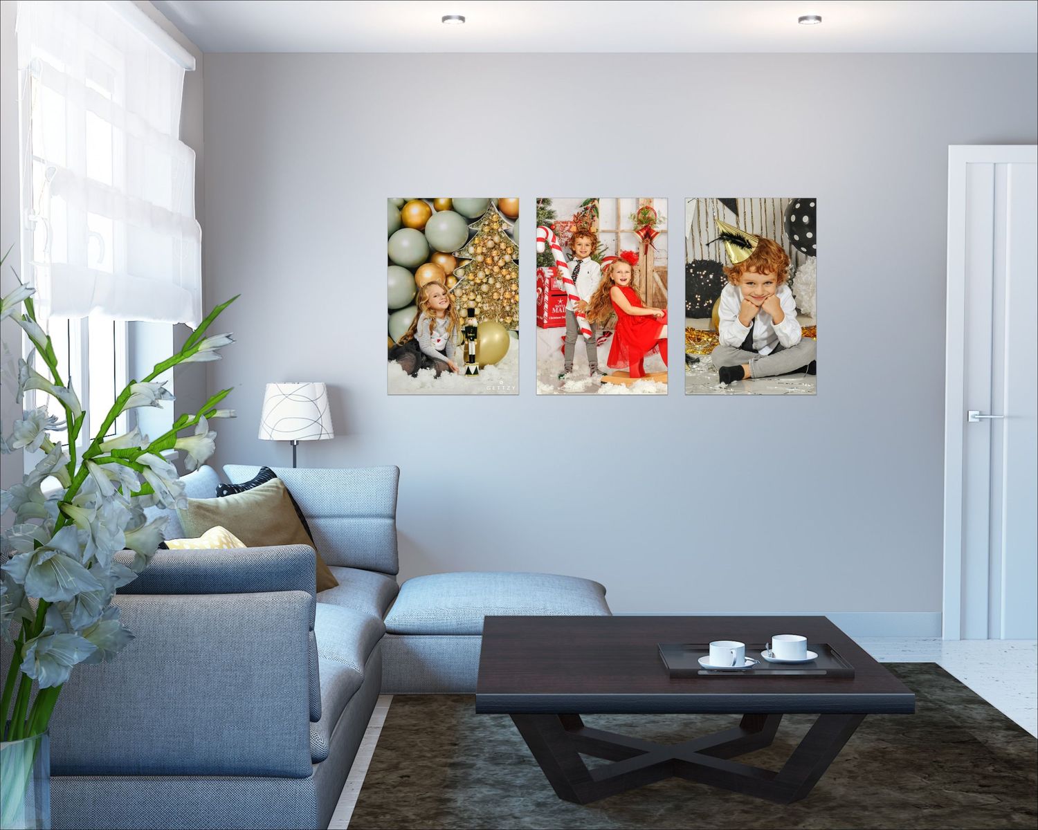 Modern living room interior with grey sofa and photo gallery wall art.