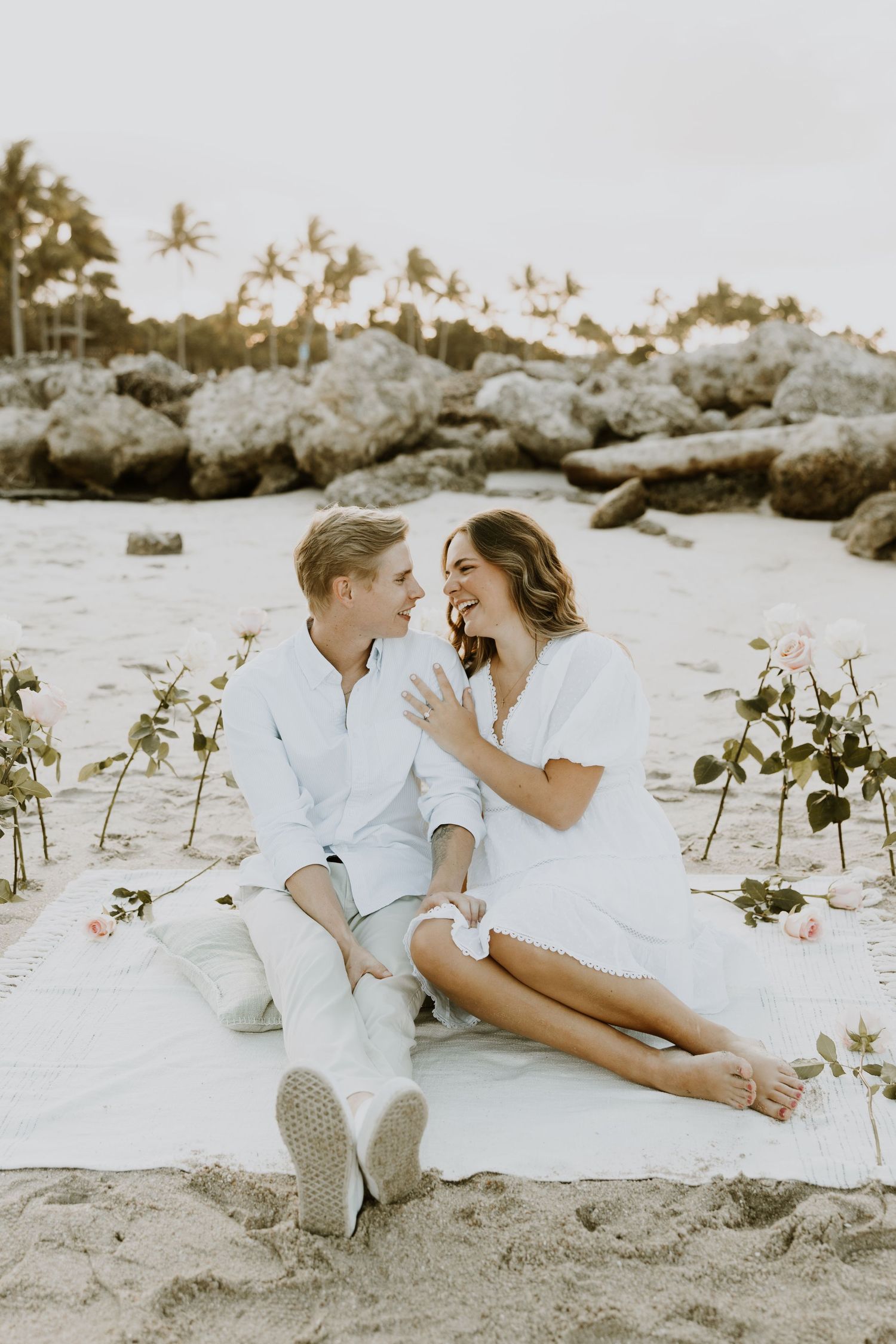 Proposal & engagement photos at the beach at Dubois Park in Jupiter, Florida captured by Lindsay McDow Photography. Florida proposal photos