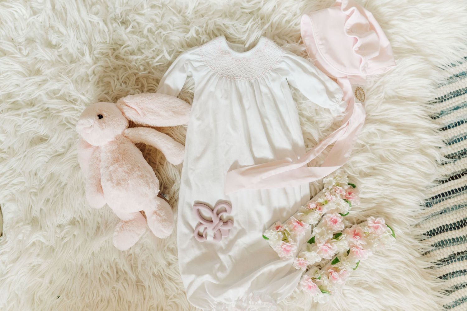 newborn session, flat lay, mementos, gifts, nursery, pink nursery, baby girl, baby clothes, baby letter, stuffed animal
