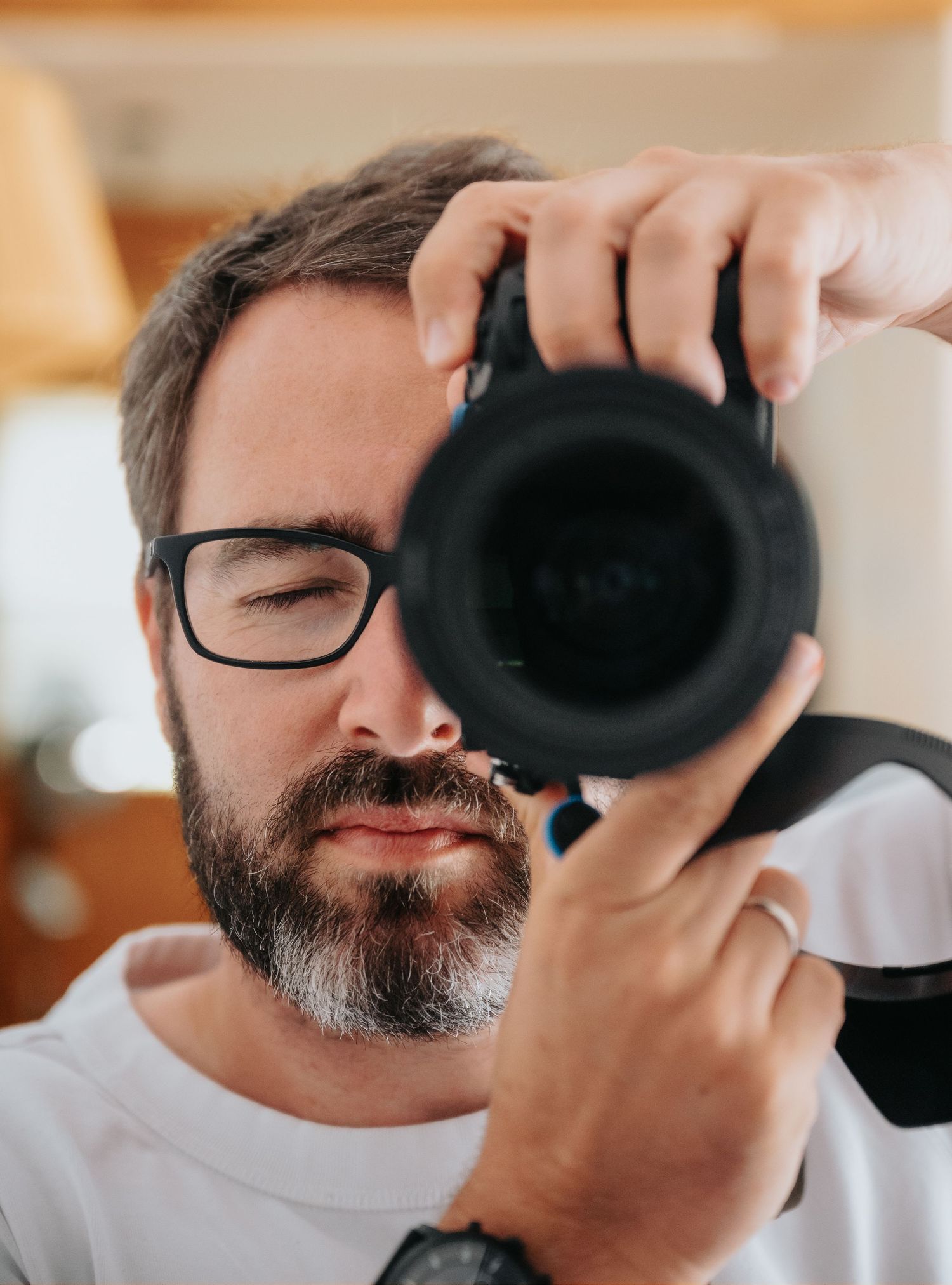 Close-up sequence of someone drinking from a black coffee mug.