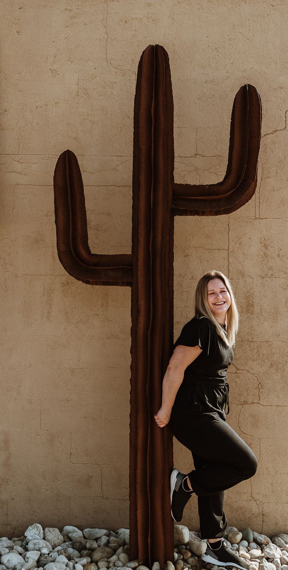 photographer Crystal with back to cactus
