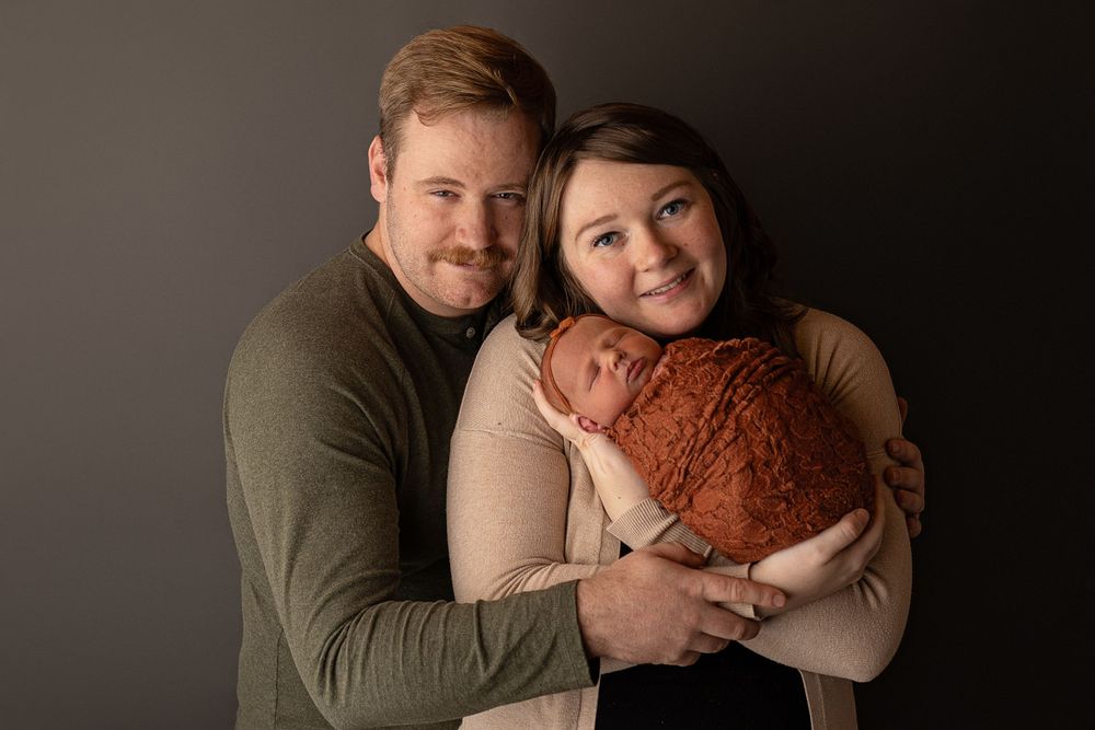 Professional newborn photo - with mom and dad