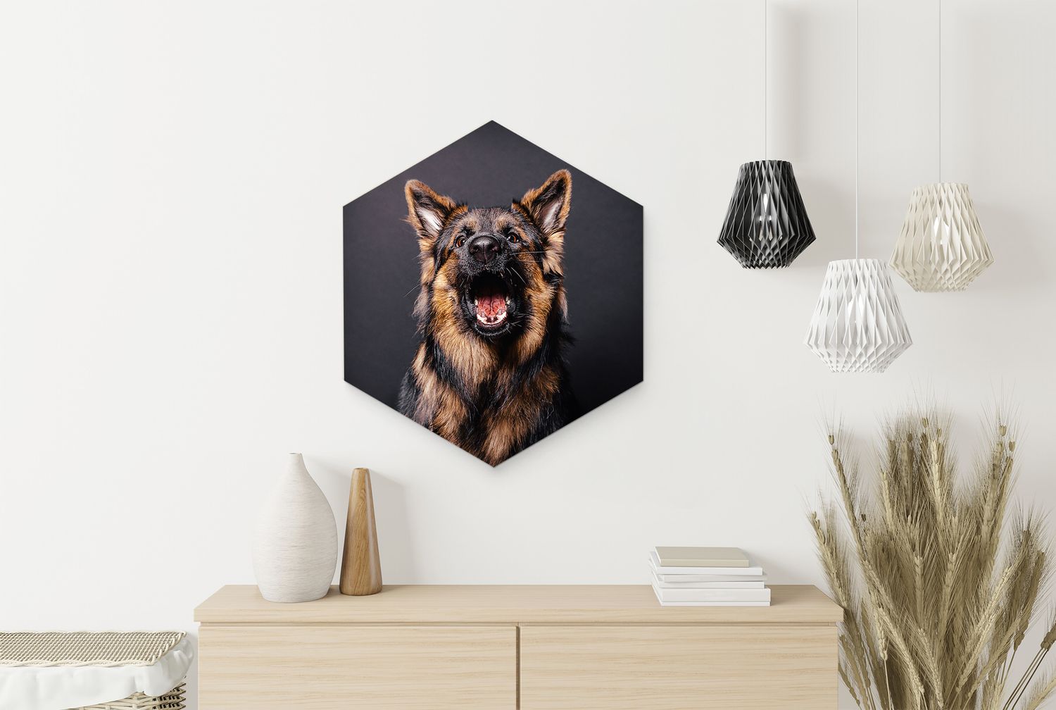 Striking hexagonal portrait of a German Shepherd dog mounted above wooden furniture with decorative lights.