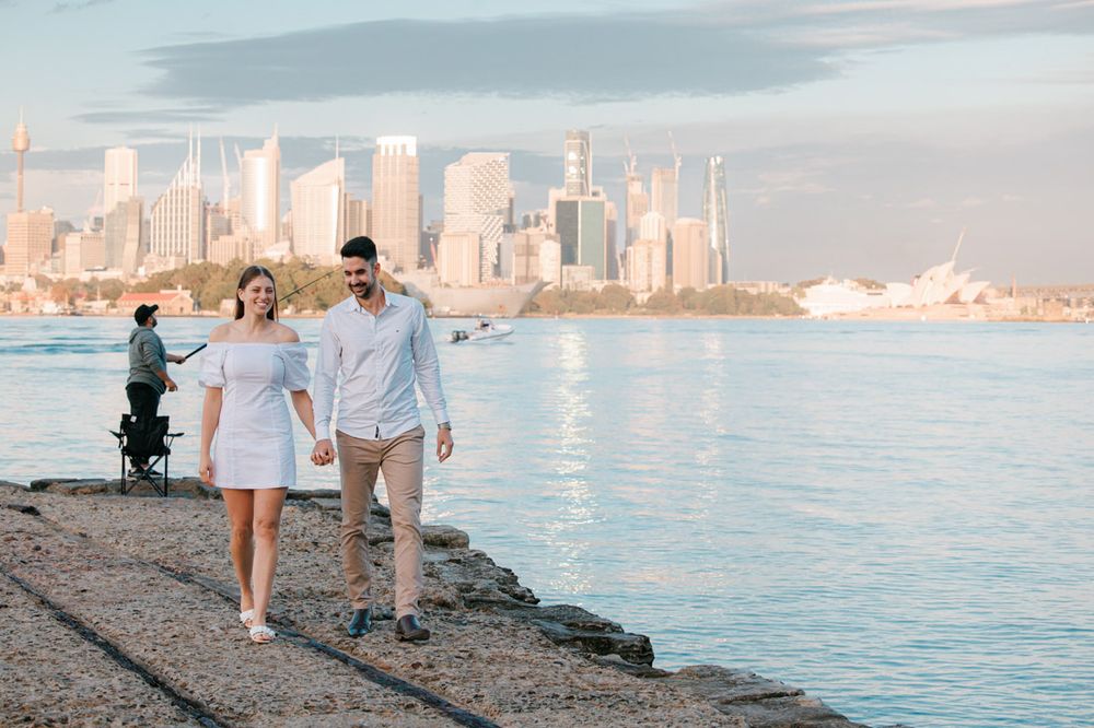 Sunset engagement session with Sydney Harbour and city views.