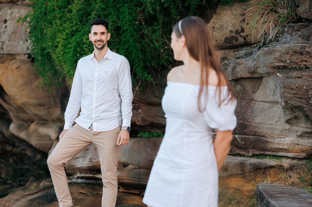 Romantic couple photos against natural sandstone rock formations.