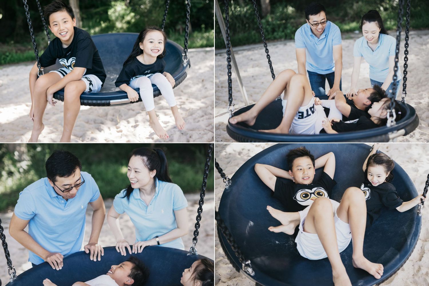 A joyful Asian family plays together on a large circular swing in a sunny outdoor setting.