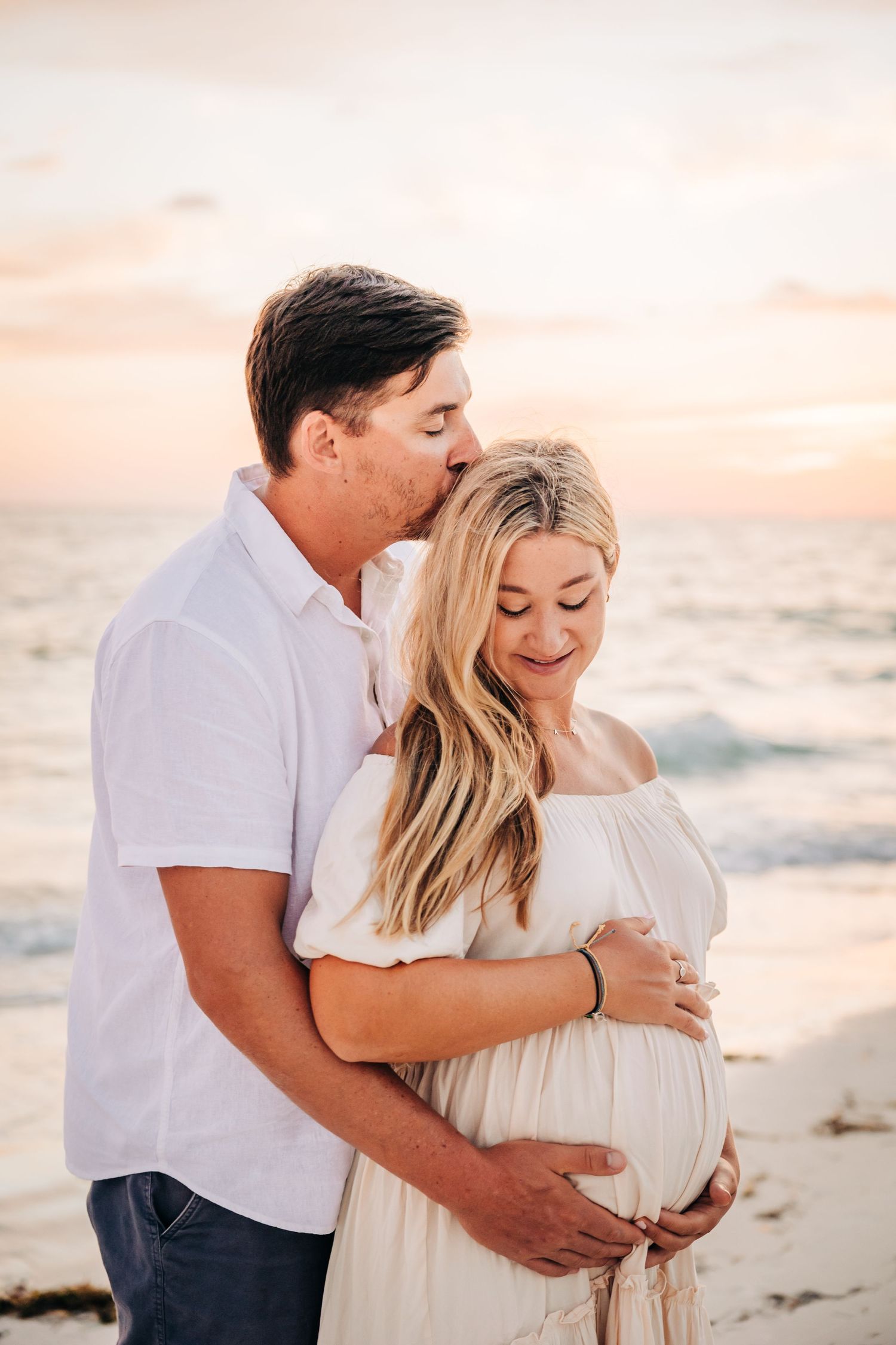 Maternity Session on Coquina Beach at sunset on Anna Maria Island taken by Sarasota family photographer.