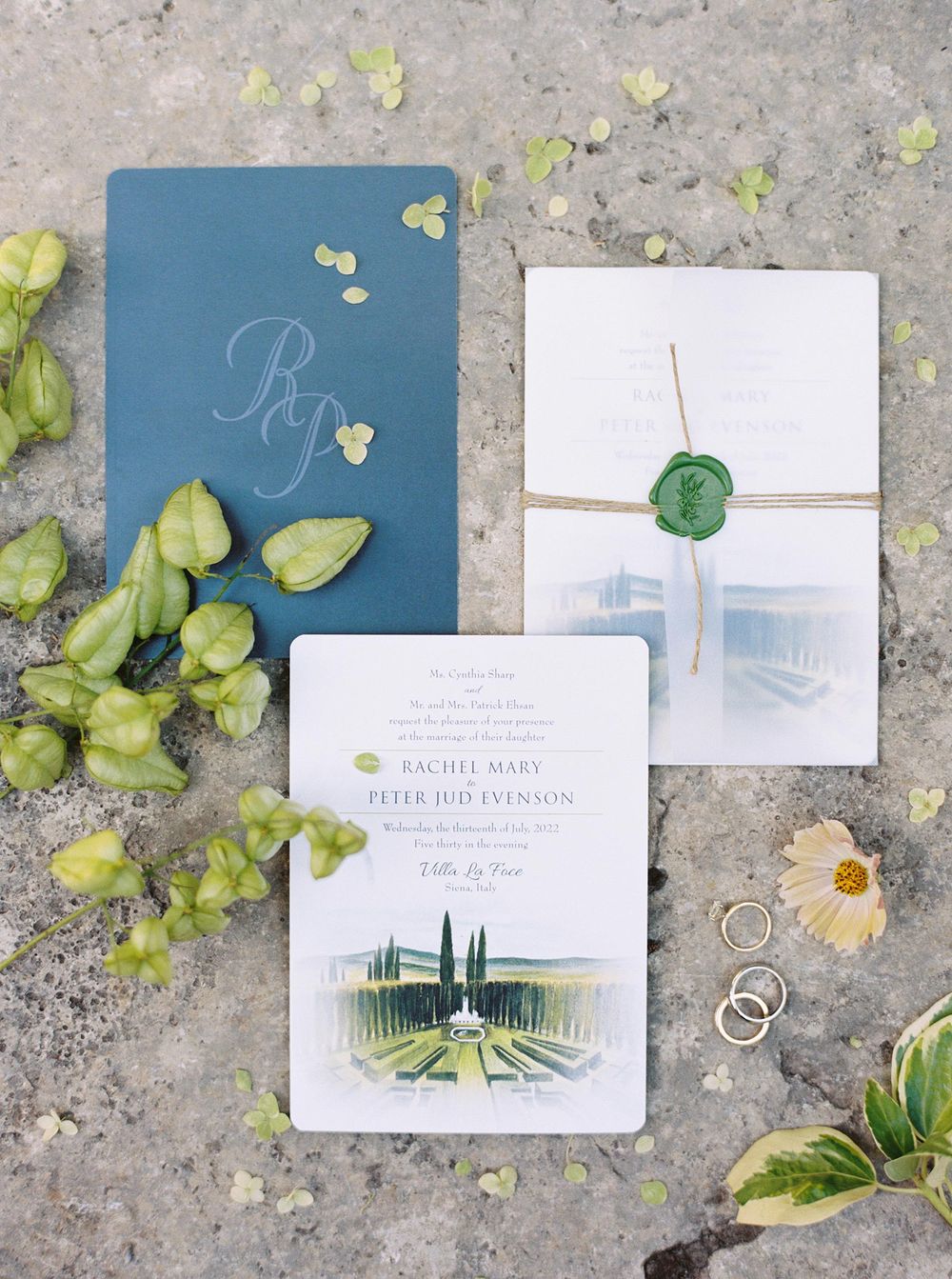 Wedding stationery featuring a green and blue theme, perfect for a vibrant and elegant celebration.