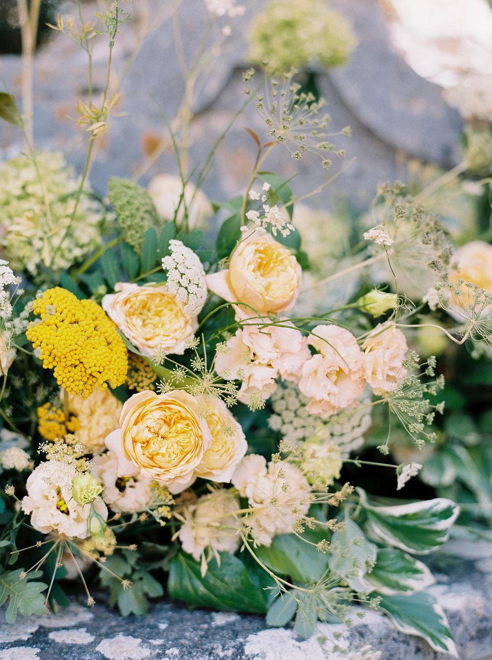 A beautiful arrangement of vibrant yellow and delicate white blooms.