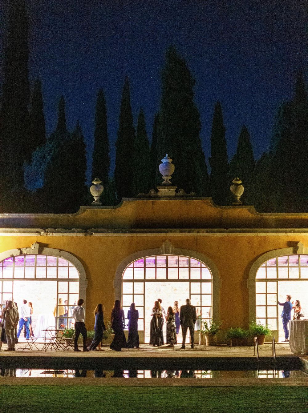 Wedding guests heading to their first dance in Tuscany.