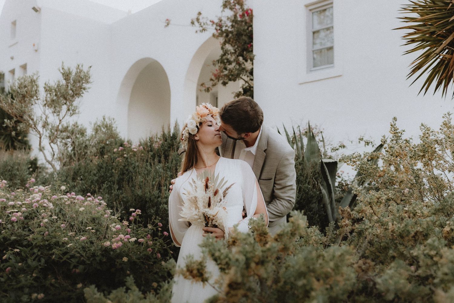 Fine art destination wedding in Santorini, Greece, showcasing an epic landscape view and a cinematic storytelling approach